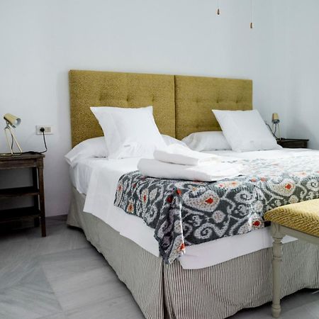 Palacio Mármoles Sevilla Habitación foto